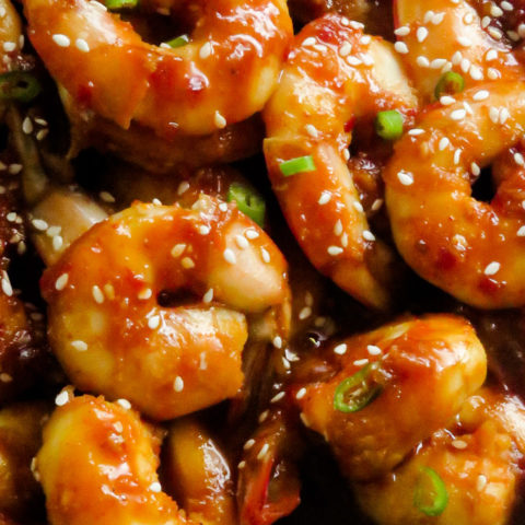 sauteed shrimp tossed in teriyaki sauce with sesame seed sprinkled over it.