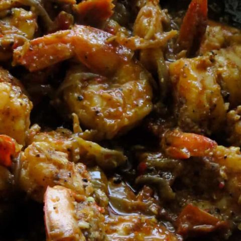 prawn vindaloo curry cooked in a pan