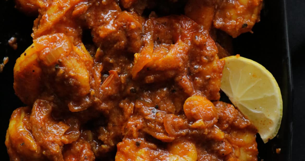 prawn masala curry dry served with lemon wedges