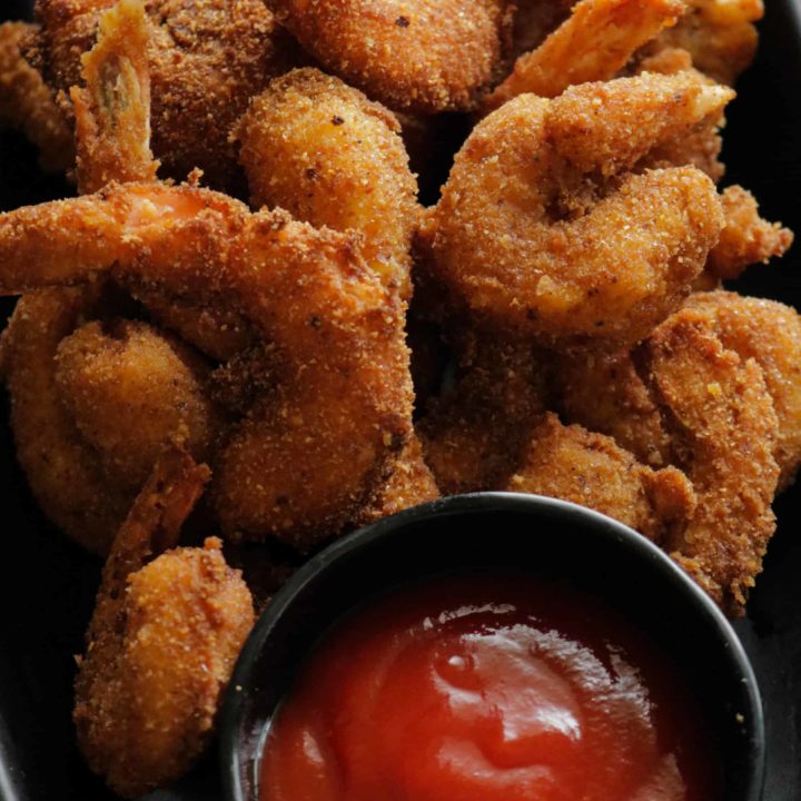 a platter of fried shrimp to serve as a starter.