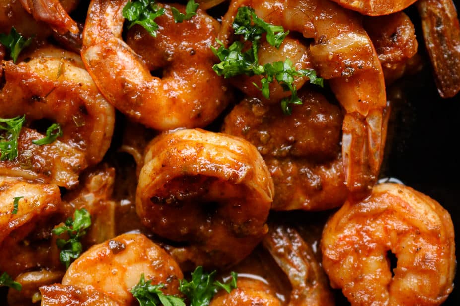 blackened shrimp garnished with lime wedges