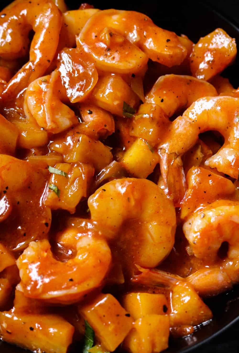 sweet and sour shrimp with pineapple.