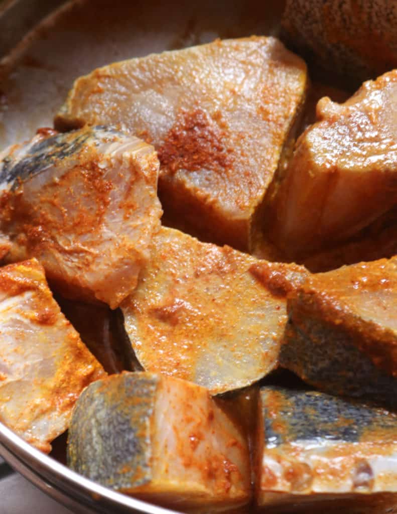 Chunks of fish covered in vindaloo paste to cook the goan fish curry recipe.